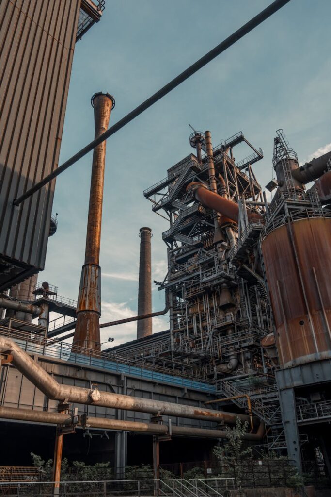 Rusty industrial structures in Duisburg's Landschaftspark, a historic German landmark.